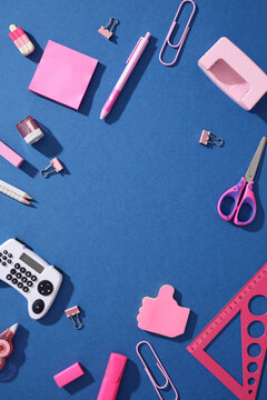Pop art school supplies with gamepad calculator flat lay