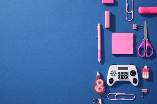 Pop art back to school flat lay with calculator gamepad