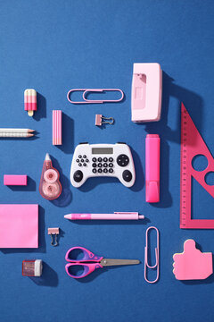 Pop art back to school flat lay with gamepad calculator