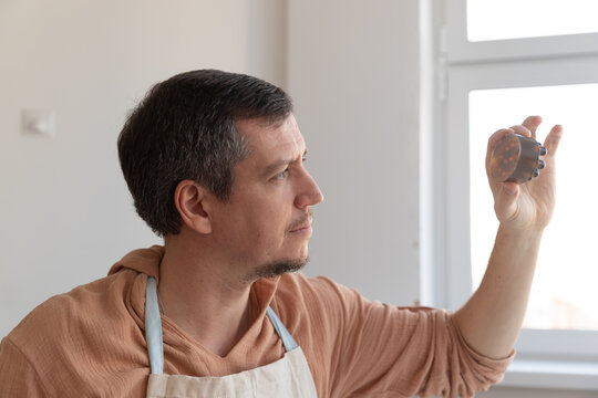 A man makes homemade soap, a hobby, creativity, additional income