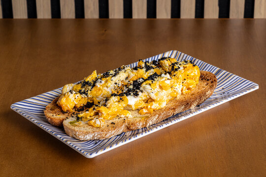Scrambled egg toast on plate for a simple morning breakfast