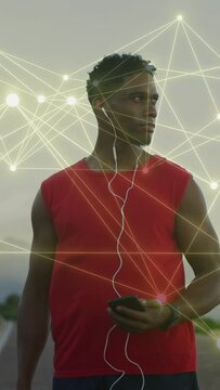 Vertical video: Fitness jogger hearing phone cue turning gaze right, network overlay mapping route