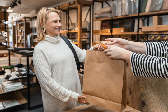 Customer shopping at a textile store cashier counter
