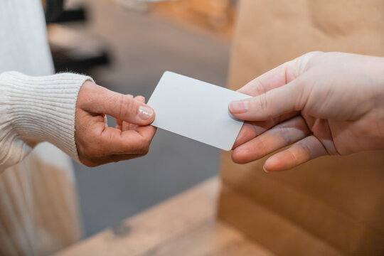 Exchange of payment card in a retail store setting