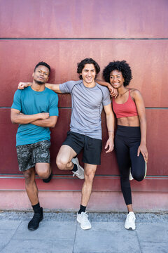Three young athlete friend relaxing after outdoor workout