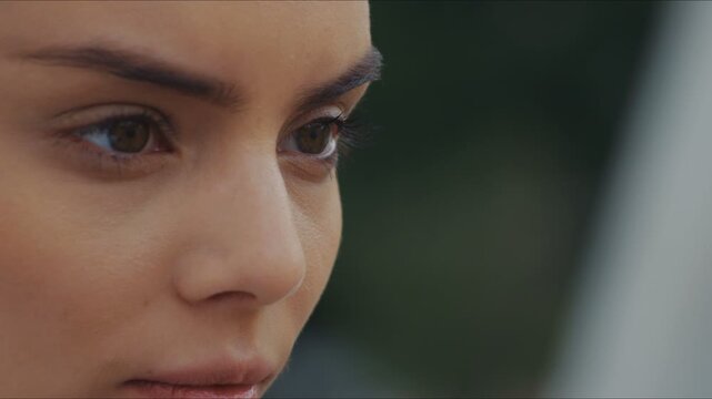 Close-up of a young attractive artist's eyes. Draw in paints. Workshops. Slow motion. Shot on RED Epic Camera.