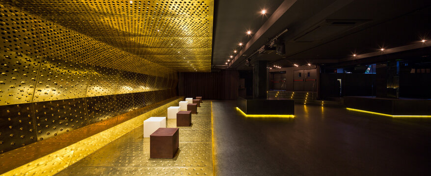 Luxury nightclub interior with golden decor