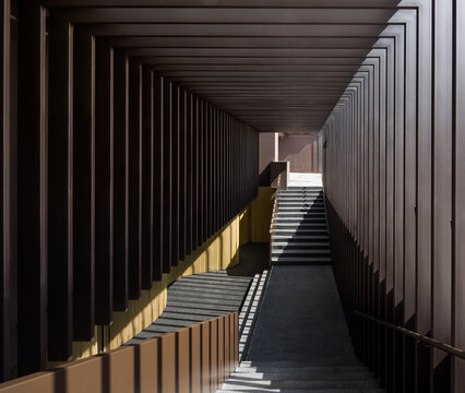 Modern architectural hallway with dramatic lighting
