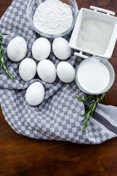 Baking ingredients with eggs, flour, sugar and milk