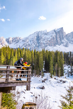 Winter viewpoint at Carezza Lake in Alto Adige, Italy