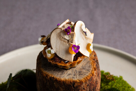 Gourmet mushroom tapa with walnut ketchup and egg yolk