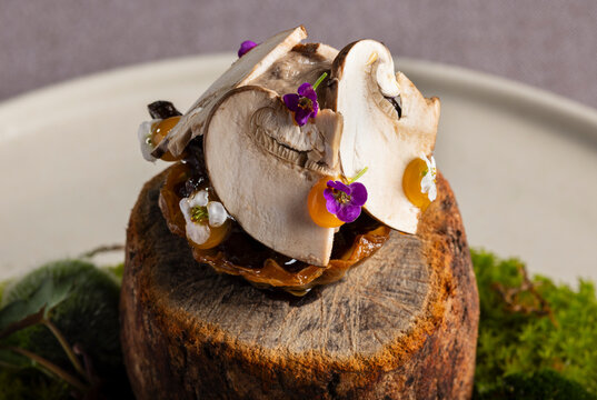 Gourmet mushroom tapa with walnut ketchup and egg yolk