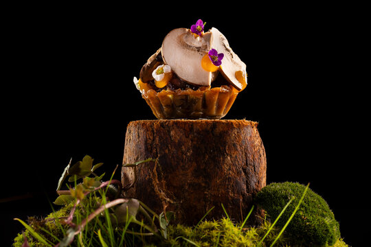 Gourmet mushroom tapa with walnut ketchup and egg yolk