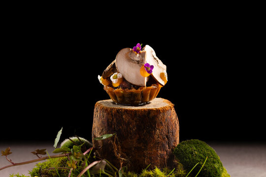 Gourmet mushroom tapa with walnut ketchup and egg yolk