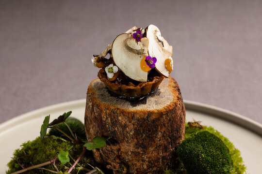 Gourmet mushroom tapa with walnut ketchup and egg yolk