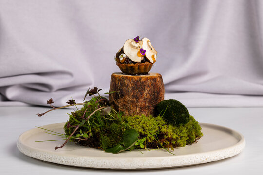 Gourmet mushroom tapa with walnut ketchup and egg yolk