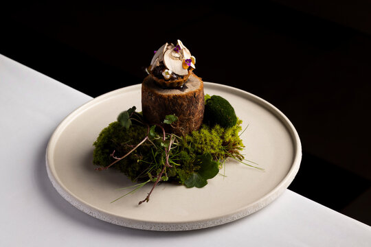 Gourmet mushroom tapa with walnut ketchup and egg yolk