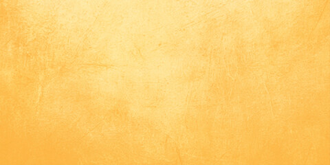 Fototapeta premium Golden yellow textured background with subtle gradient effect for design and branding use