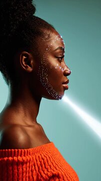 This demonstrates face recognition technology with a woman having a beam of light shining on her face, highlighting facial features for identification and authentication purposes.