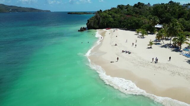 Aerial drone view of beautiful caribbean tropical island Cayo Levantado beach with palms. Bacardi Island, Dominican Republic. Vacation background.