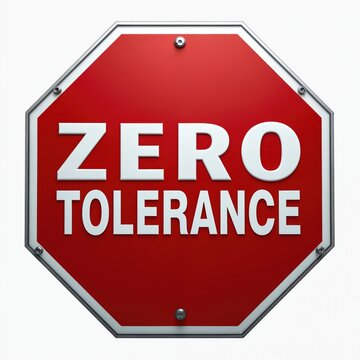 Red octagonal sign with white text ZERO TOLERANCE. Symbolizes firm stance against workplace harassment bullying or discrimination. Modern policy announcement for companies.