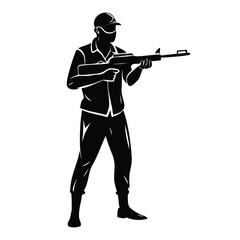 Obraz premium Man with a gun standing in a defensive position, ready for action. The man holds firearm firmly while wearing tactical clothing and a cap, embodying readiness for any situation.