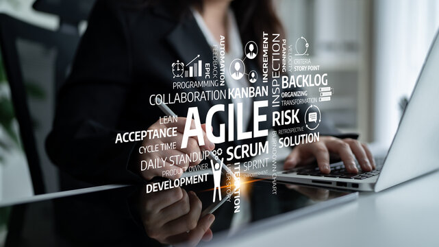 A professional woman works on her laptop in a modern office, engaging with agile project management concepts such as Scrum, Kanban, and collaboration for effective teamwork. Tessel