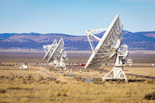 Aligned Radio Telescope Dishes at NRAO VLA in New Mexico