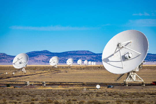 Aligned Radio Telescope Dishes at NRAO VLA in New Mexico