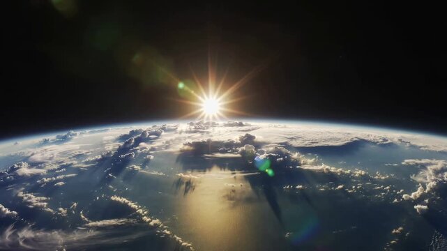 Earth planet sunrise view from space with lens flare and clouds aerial shot