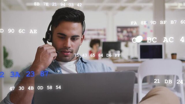 Tech agent using laptop, adjusting mic, speaking, typing while code overlay streaming across frame