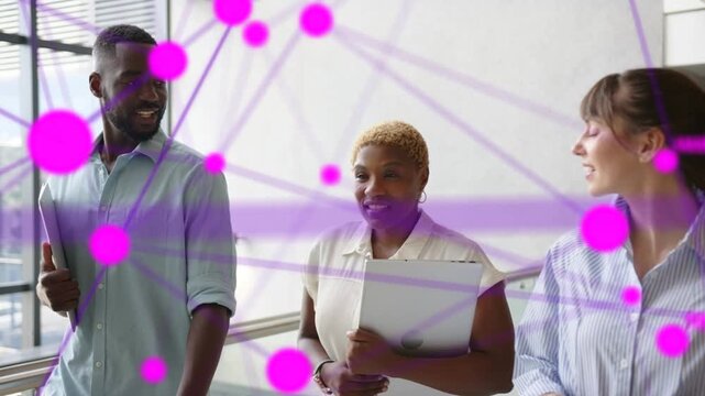 Three colleagues walking, discussing business while magenta nodes forming network, overlaying faces