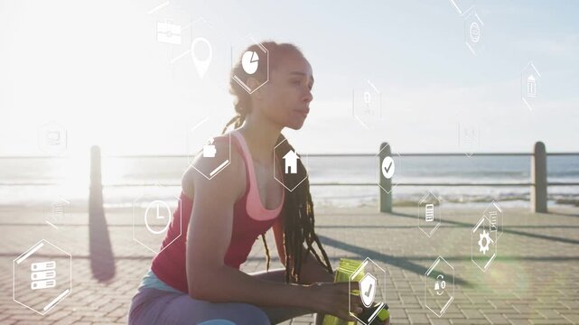 Woman pausing fitness workout, lifting bottle hydrating while HUD icons highlighting heart rate