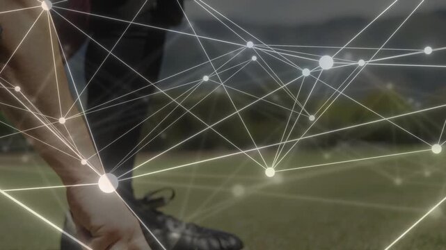 Male catcher crouching, reacting to incoming baseball, raising mitt while overlay tracing glove