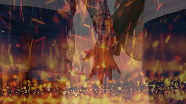 Two women walking, one reaching back, fingers linking in ember overlay, seeking connection for film