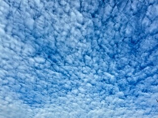 Beautiful Altocumulus Clouds Pattern in a Bright Blue Sky © Fitri