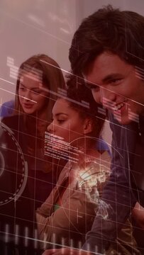 Vertical video: Tech team typing at monitor, animating HUD graphs and globe, analyzing data