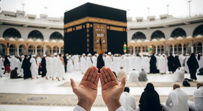 Devotion at the kaaba hands raised in prayer at the grand mosque