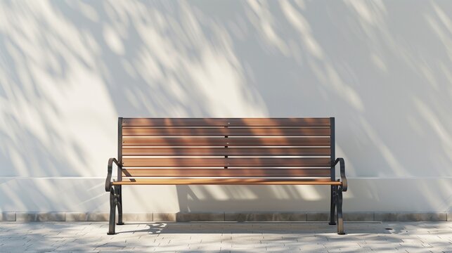Wooden bench against wall with sunlight shadows in minimal outdoor space