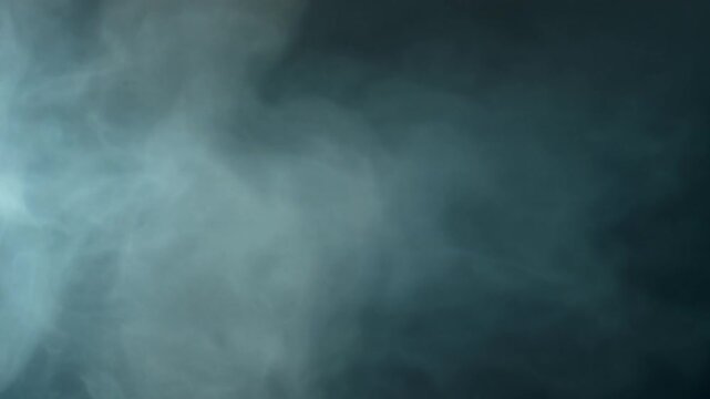 Smoky or foggy atmosphere with a dark background, ideal for creating mysterious, dramatic, or eerie designs like book covers or posters.
