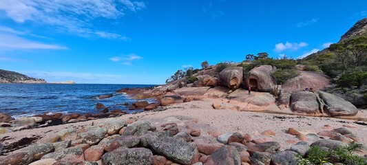 Large boulders and rocks on the shore of the sea © HDC Creative