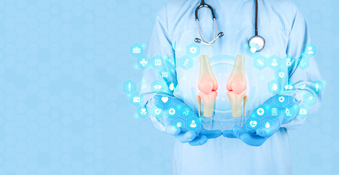 Physiatrist demonstrates the biomechanical function of the knee. Detailed joint assessment, knee osteoarthritis, preventative diagnosis of patellar health. Modern medicine. Light blue background.