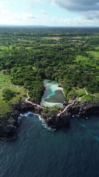 Weekuri (Waikuri) Lagoon, Crystal-clear water surrounded by cliffs, Sumba, Bali, Indonesia 
