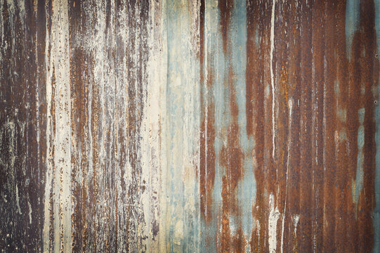 Old zinc wall texture background, rusty on galvanized metal panel sheeting.