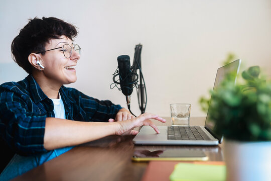 Hispanic woman dubbing voiceover for broadcast stream live show