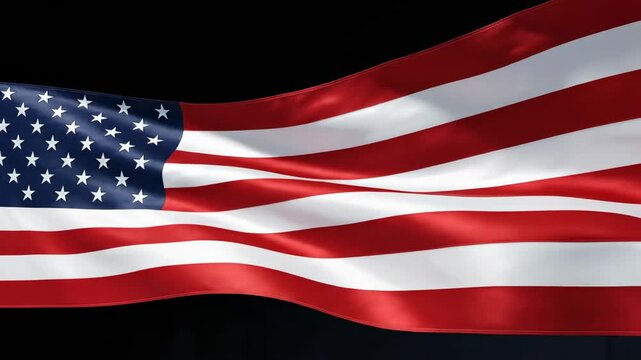 Waving United States flag with stars and stripes, red white and blue fabric rippling in the wind on a dark background, patriotism and freedom concept