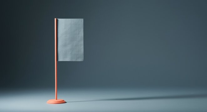 Large copy space surrounds a blue flag mockup on an orange wooden pole standing on a solid floor for boutique branding, product presentation and corporate identity