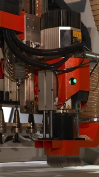 Automated Tool Swapping System Efficiently Manages Router Bits During Rapid Panel Manufacturing Processes . Media
