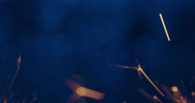 Bright sparks fly across a dark blue background creating a dynamic industrial atmosphere.