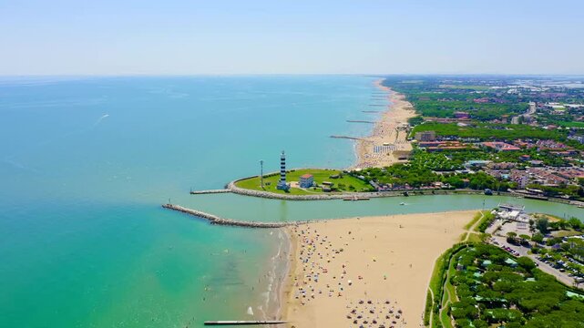 Italy, Jesolo. Lido di Jesolo, or Jesolo Lido, is the beach area of the city of Jesolo in the province of Venice. Drone footage, Departure of the camera
